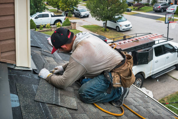 Professional Roofing technician working in Green Lake, WI